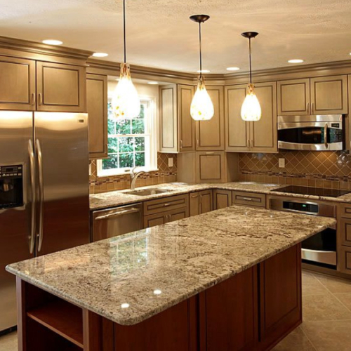 New Kitchen installed into home with new wooden cabinets and counter top