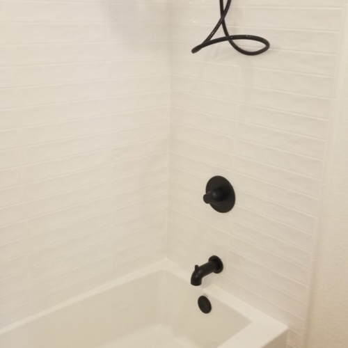 white tile shower