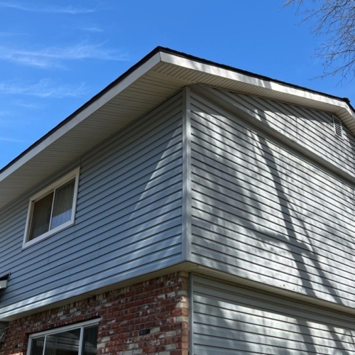 grey and brick house