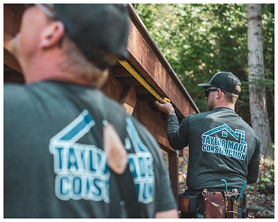 Taylor Made Employees working on roof